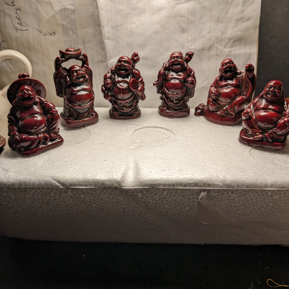 6- 2" Red Resin Buddha statues. All are in different poses.